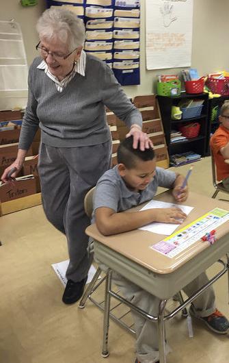 OUTLOOK 2019: Volunteers pitch in to keep schools running smoothly, helping teachers, feeding the masses and pushing those candy bar sales